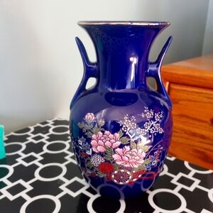 Vintage blue vase with beautiful floral design